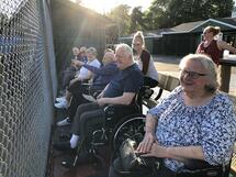 residents at baseeball game