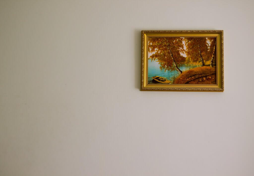 Framed art on wall.